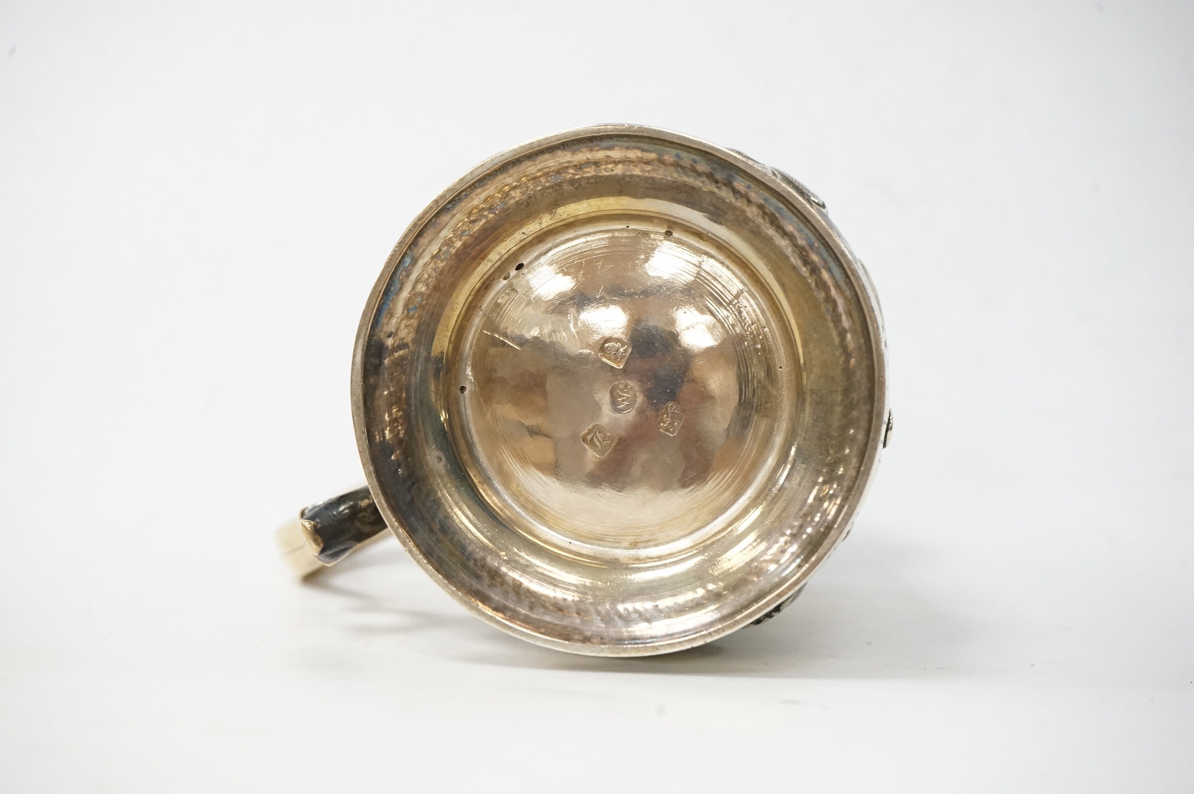 A George III silver baluster mug, with later embossed decoration and later engraved inscription, William Skeen, London, 1766, 12.6cm, 11.3oz. Condition - fair